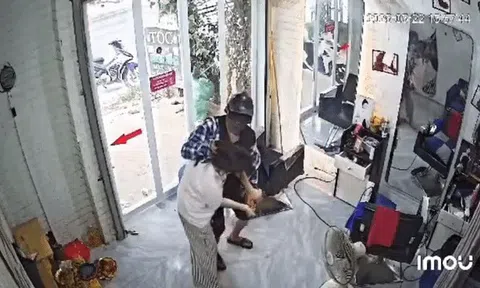 Nữ chủ tiệm cắt tóc bị kẻ trùm mặt xông vào quán tấn công