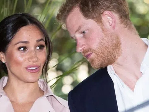 Hoàng gia Anh nói về thông tin cắt Meghan khỏi bức ảnh với Harry